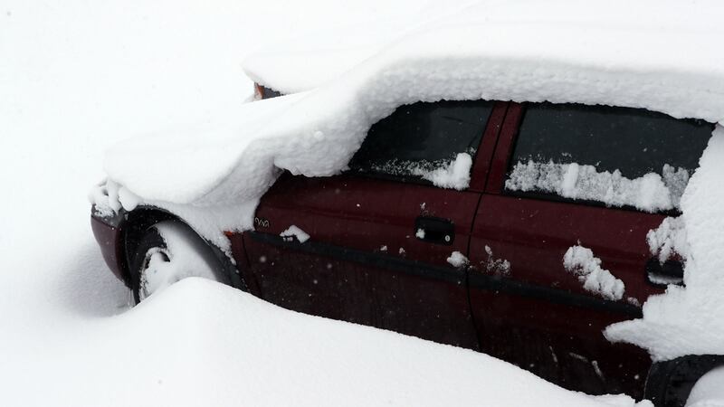 Cars buried in snow in Naas, Co Kildare, as the severe weather conditions continue. Photograph: Niall Carson/PA Wire