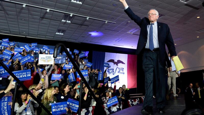 Vermont Senator and US Democratic presidential candidate Bernie Sanders acknowledges supporters during his Iowa caucus watch party in Des Moines. Photograph: Larry W Smith/EPA