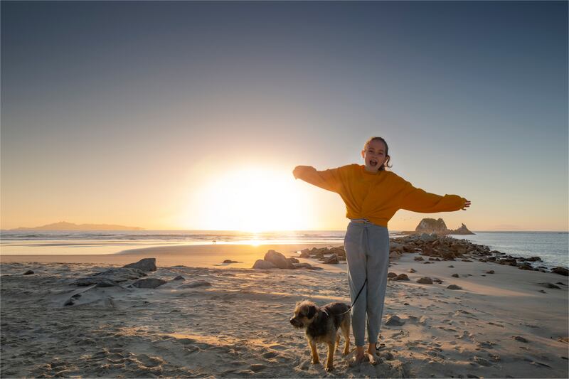 One of the campaign stills from Gallery’s Good Morning World campaign, designed to draw tourism to New Zealand, taken at Mangawhai Heads, Northlands, one of the first places on the planet to greet the rising sun
