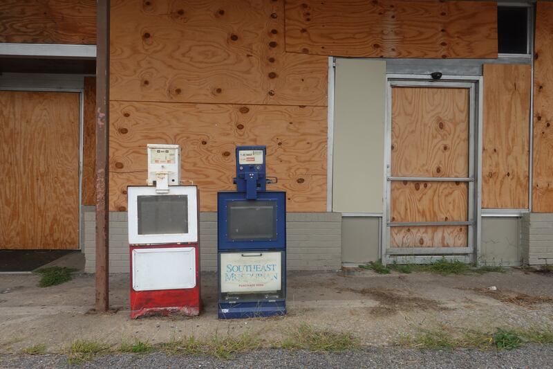 Newspaper boxes sit in front of a shuttered grocery store in Cairo, Illinois. Photograph: Scott Olson/Getty Images