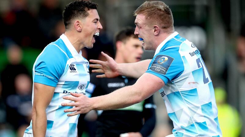 Leinster’s Noel Reid celebrates scoring their fourth against Glasgow Warriors with Dan Leavy. Photograph:   Ryan Byrne/Inpho