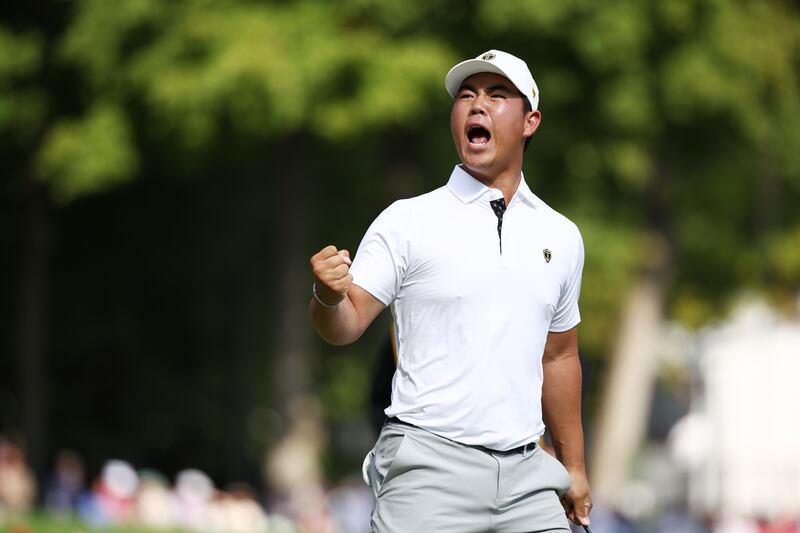 MONTREAL, QUEBEC - SEPTEMBER 28: Tom Kim of South Korea and the International Team celebrates on the 14th green during Saturday Morning Four-Ball on day three of the  2024 Presidents Cup at The Royal Montreal Golf Club on September 28, 2024 in Montreal, Quebec, Canada. (Photo by Jared C. Tilton/Getty Images)