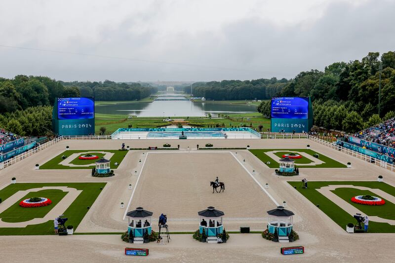 Sarah Ennis of Ireland riding Action Lady M during the Paris 2024 Olympic Games equestrian team and individual eventing dressage at Chateau de Versailles. Photograph: Erik S Lesser / EPA
