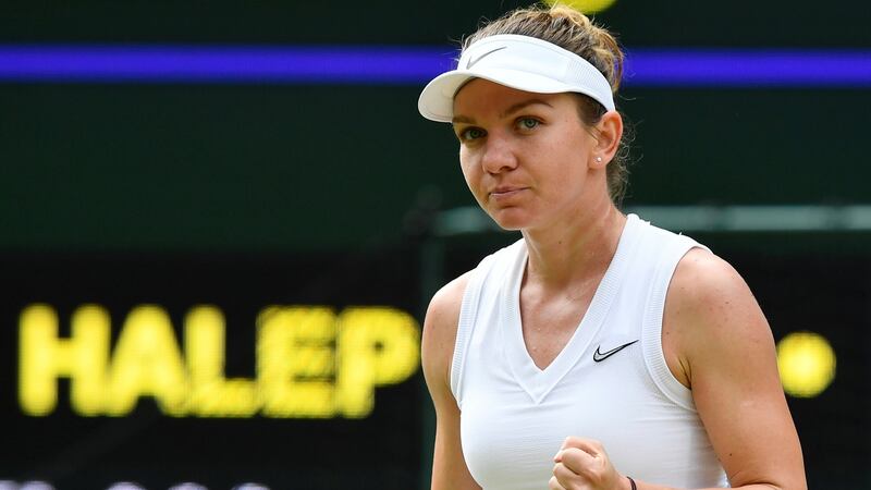 Romania’s Simona Halep celebrates her ‘solid’ victory over Belarus’ Victoria Azarenka at Wimbledon. Photograph: Toby Melville/Reuters