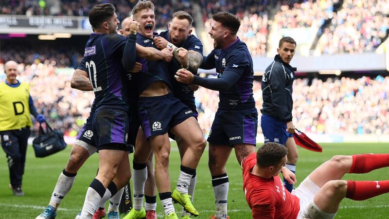 Darcy Graham of Scotland celebrates scoring his side’s first try  during the  Six Nations match against  Wales at Murrayfield. Photograph: Stu Forster/Getty Images