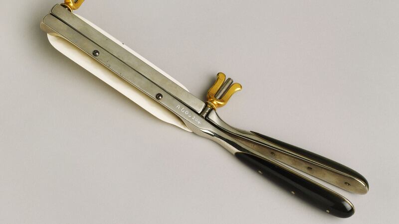 This instrument is a type of clamp designed by the surgeon Isaac Baker Brown (1812-1873) for use with a cautery iron. The cautery clamp was probably used during ovariotomy to control the bleeding from blood vessels. Photograph: SSPL/ Getty Images