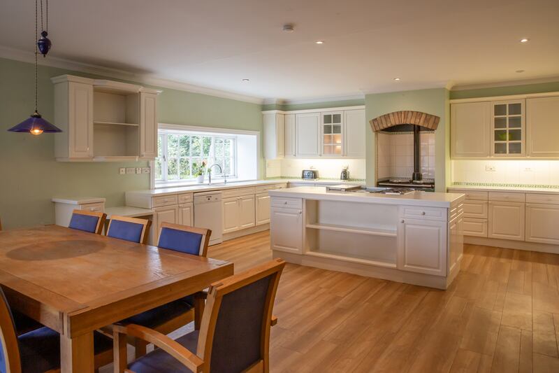 Also on the ground floor is a large eat-in kitchen