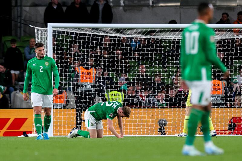 Ireland's Nathan Collins dejected after conceding a second goal. photograph: Ryan Byrne/Inpho