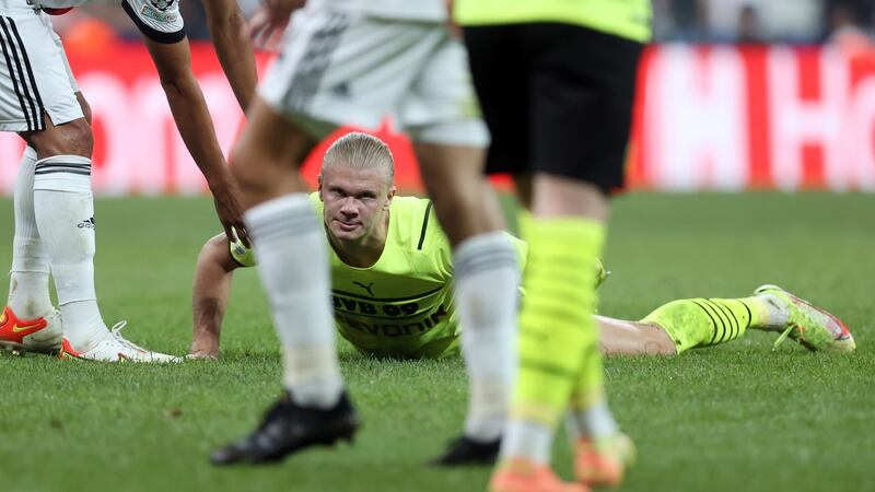 Erling Haaland on the ground during Borussia Dortmund’s win away to Besiktas. Photograph: Alex Grimm/Getty