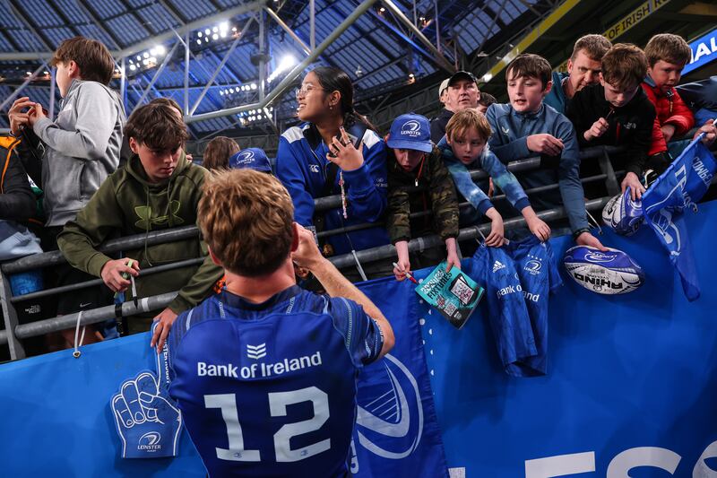 Leinster's Jordie Barrett signs autographs, a tiny part of his social load. Photograph: Ben Brady/Inpho