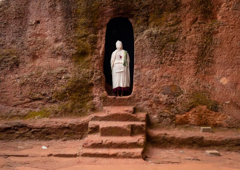 A pilgrim in a rock-hewn church in the Amhara region, Lalibela, Ethiopia in April 2023. Photograph: Eric Lafforgue/Art in All of Us/Corbis via Getty Images