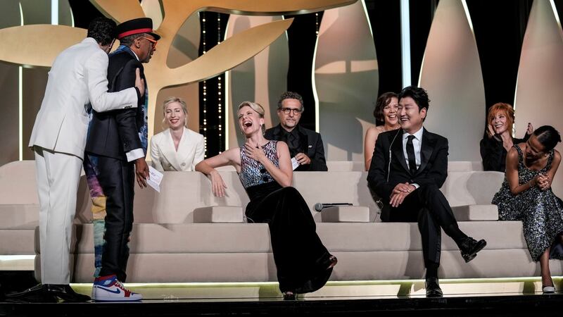 Jury president Spike Lee (second from left) accidentally reveals the film Titane as the winner of the Palme d’Or as jury members Tahar Rahim (from left), Jessica Hausner, Melanie Laurent Kleber Mendonca Filho, Maggie Gyllenhaal, Song Kang-ho, Mylene Farmer and Mati Diop look on during the awards ceremony at the 74th Cannes Film Festival. Photograph: Vadim Ghirda/AFP
