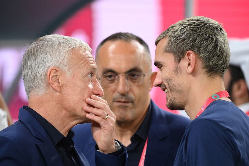 Didier Deschamps speaks with France's forward Antoine Griezmann. Photograph: Franck Fife/AFP via Getty