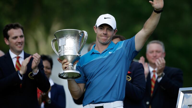 Rory McIlroy  poses with the trophy after  the second of his victories at the Wells Fargo Championship at Qauail Hollow in May 2015. Photograph: Jeff Gross/Getty Images