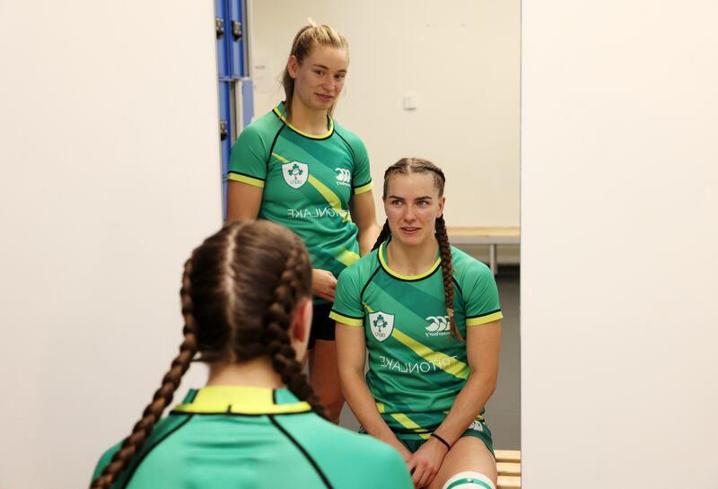 Kathy Baker braids Katie Farrell's hair in the changing rooms. Photograph: Laura Hutton