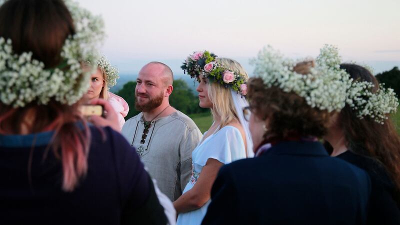 Jeff Olsen and Anna Lisa Van Bloem from Utah celebrate their marriage on the Hill of Tara. Photograph Nick Bradshaw/The Irish Times