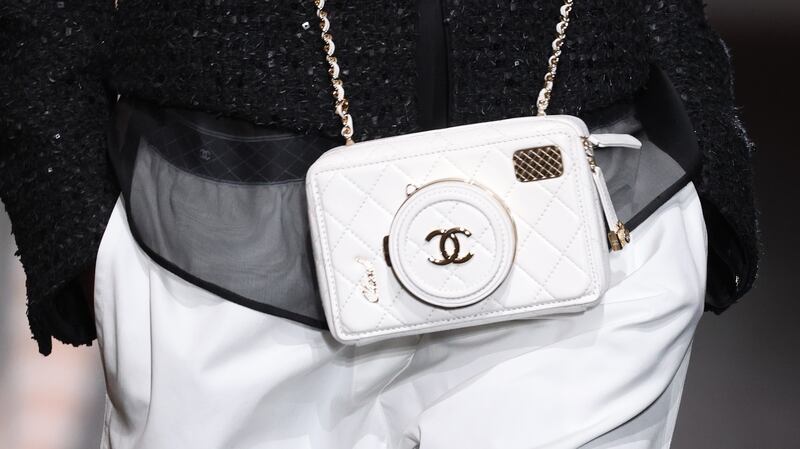 A Chanel bag on the runway at Paris Fashion Week: as Chanel bags have grown more expensive, craft hasn’t kept pace. Photograph: Pascal Le Segretain/Getty Images