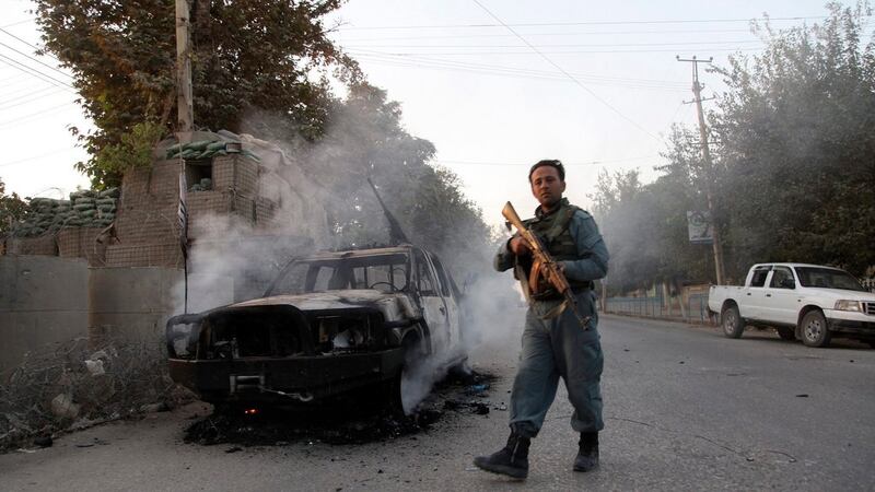 Afghan security forces move to the center of the Kunduz on October 1st. Photograph: Jawed Kargar/EPA