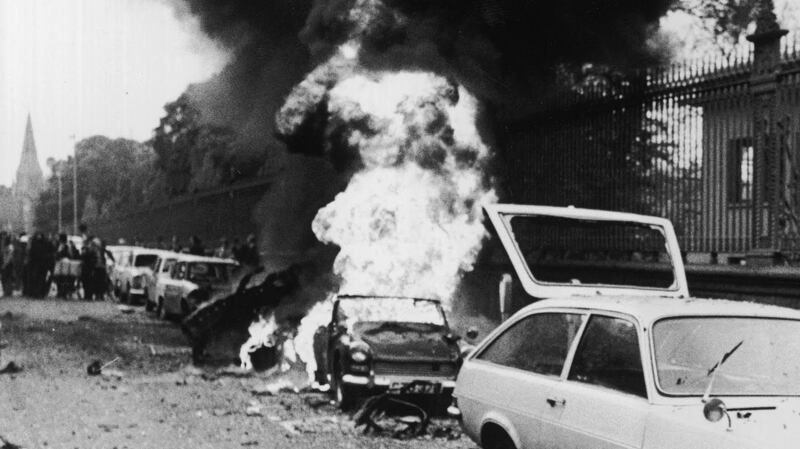 Dublin bombings: a car burns on South Leinster Street after one of the explosions in the city in May 1974. Photograph: Tom Lawlor