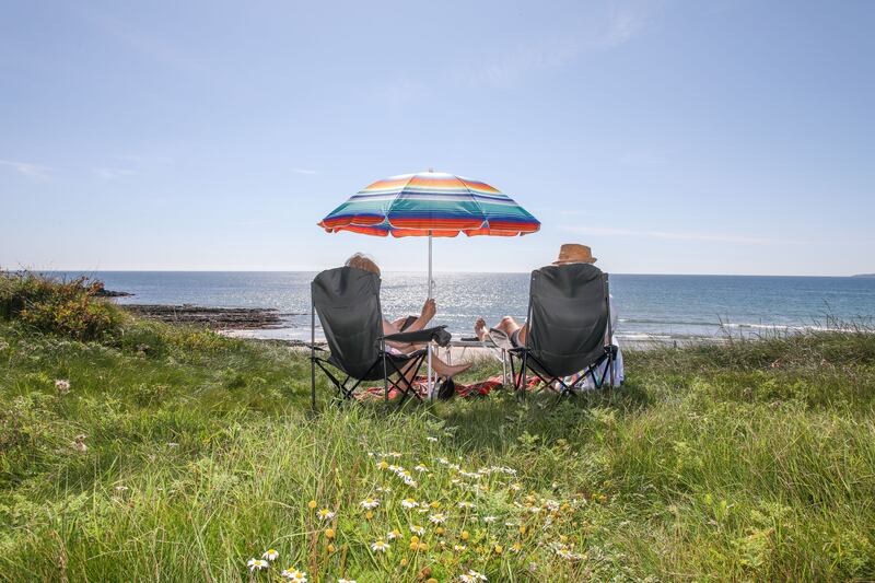 Dolores and Michael Healy from Waterfall enjoy the good weather at Garrettstown, Co Cork on September 3rd. Photograph: David Creedon