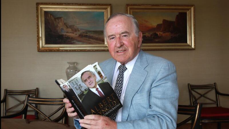 Former taoiseach Albert Reynolds photographed with a copy of his autobiography in September 2009. Photograph: Brenda Fitzsimons/The Irish Times.