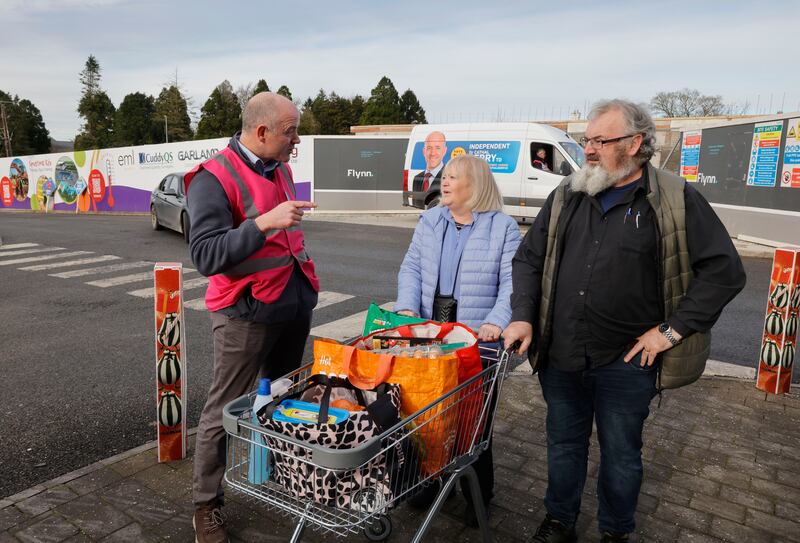 Kildare South Independent TD Cathal Berry speaks to John and Breda Reidy from the Curragh. Photograph: Alan Betson