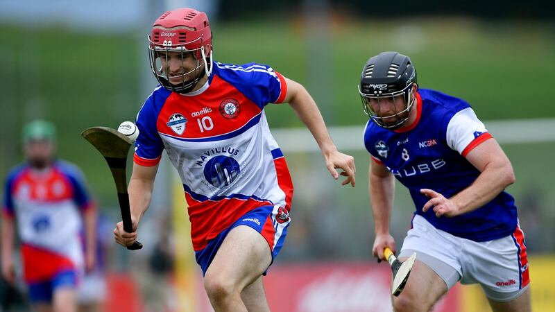 David Lewis of New York GAA against Liam Callejas of NCGAA, USA. Photograph:  Piaras Ó Mídheach/Sportsfile