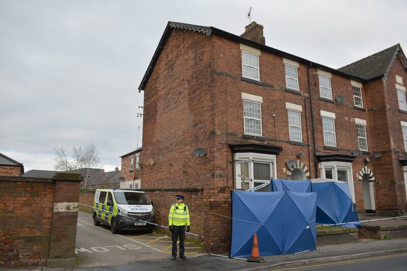 Police tents in Woverhampton Road, Stafford, as forensic officers continue their search at the property linked to  Khan. Photograph: Jacob King/PA Wire