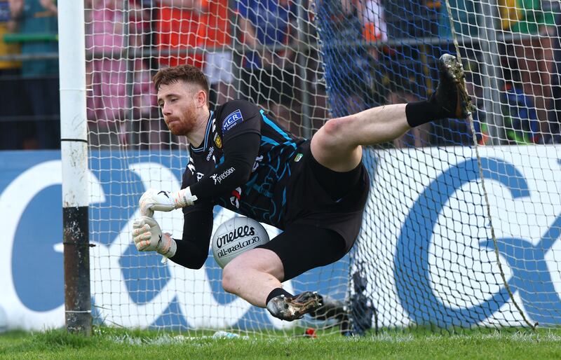 Shaun Patton makes the crucial save during the shootout to secure Donegal the Ulster title in Clones. Photograph: James Crombie/Inpho 
