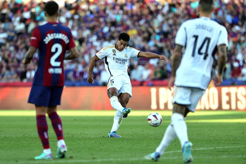 Jude Bellingham scores the equalising goal during the Spanish league football match between FC Barcelona and Real Madrid CF in Barcelona. Photograph: Lluis Gene/AFP via Getty Images