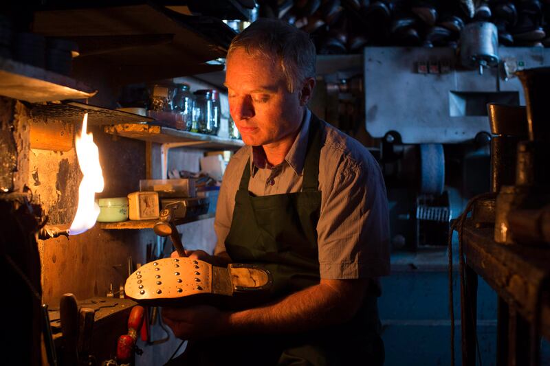 The father of two specialises in taking worn-out or damaged designer footwear and creating a better-performing shoe