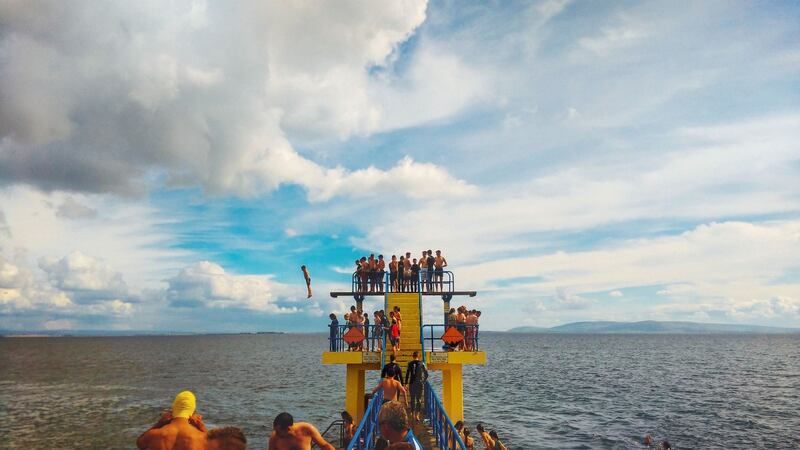 Swimmers  cool off in the warm temperatures at Salthill, Galway. Photograph: Brian Arthur