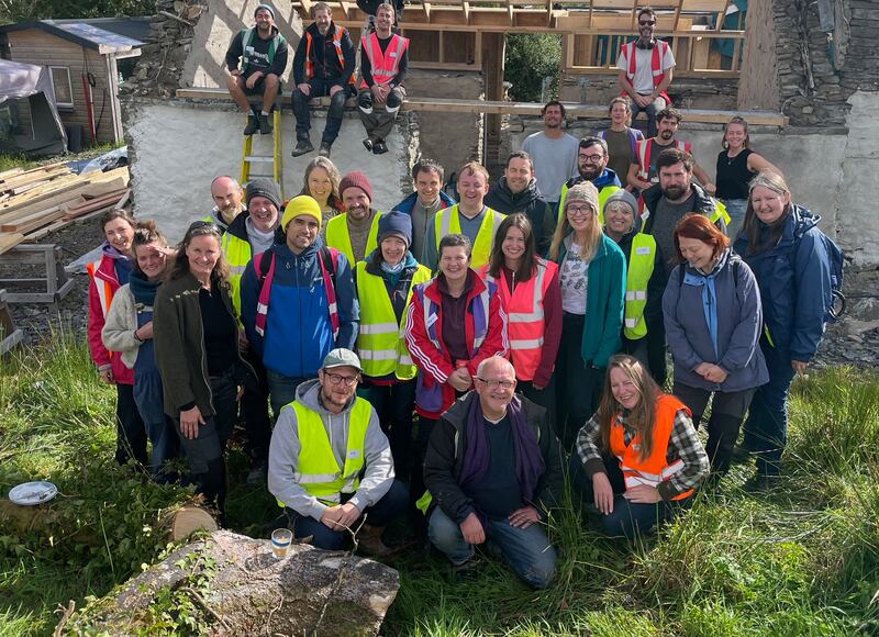 A build school group following a week spent learning to renovate a stone cottage. Photograph: Common Knowledge