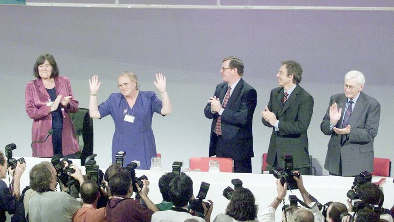 Mo Mowlam is congratulated by Deputy First Minister of the Northern Ireland Assembly Seamus Mallon, British prime minister Tony Blair, First Minister  David Trimble, and British minister for overseas development Clare Short  after her speech at the Labour Party conference. Photograph: Paul Hackett / Reuters