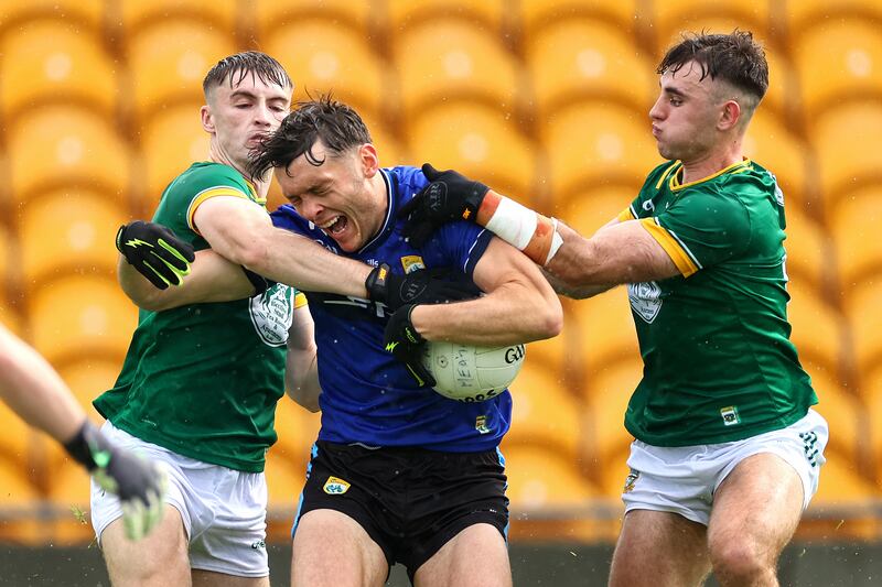 Kerry’s David Clifford is challenged by Meath’s Seán Rafferty and Seán Coffey during the game in Tullamore. Photograph: Tom O'Hanlon/Inpho