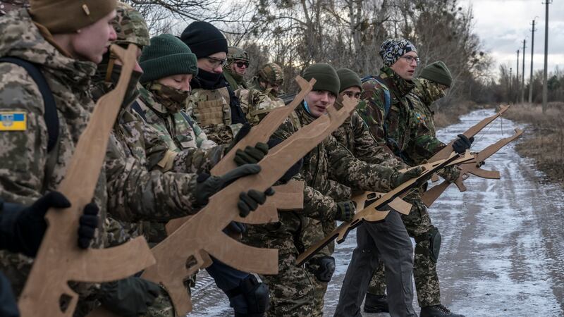 Members of the Kyiv Territorial Defence Unit are trained in an industrial area in Kyiv as worries of  a Russian invasion mount. Photograph: Brendan Hoffman/Getty Images