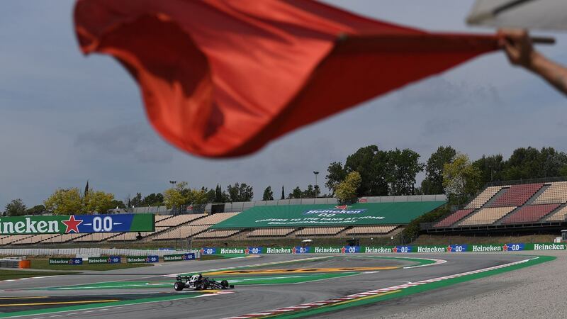 The red flag is waved during the first practice session at the Circuit de Catalunya on Friday in Montmelo on the outskirts of Barcelona ahead of the Spanish Formula One Grand Prix. Photograph: Getty