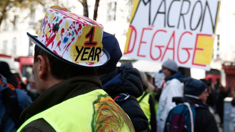 Protesters gather in central Paris to mark the one-year anniversary of the protest movement. Photograph: EPA