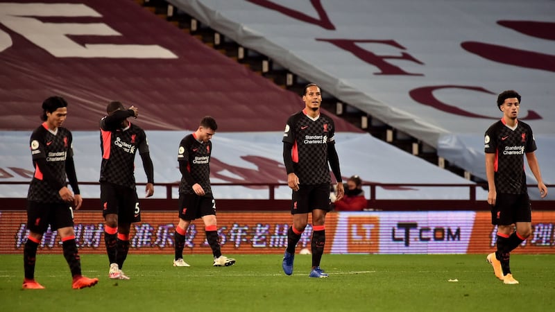 Liverpool’s Virgil van Dijk and his teammates look dejected after they concede a sixth goal. Photo: Rui Vieira/NMC Pool/PA Wire