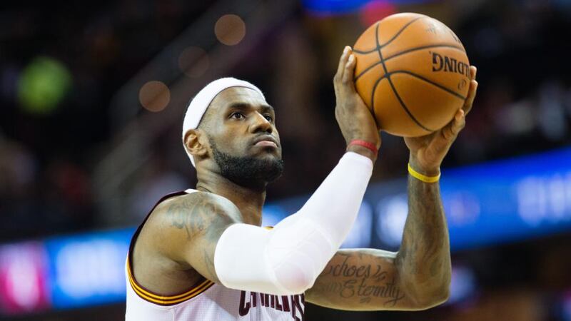 LeBron James of the Cleveland Cavaliers shoots a free-throw  against the Orlando Magic at Quicken Loans Arena on November 24th, 2014. The Cavaliers defeated the Magic 106-74.  Photograph:   Jason Miller/Getty Images