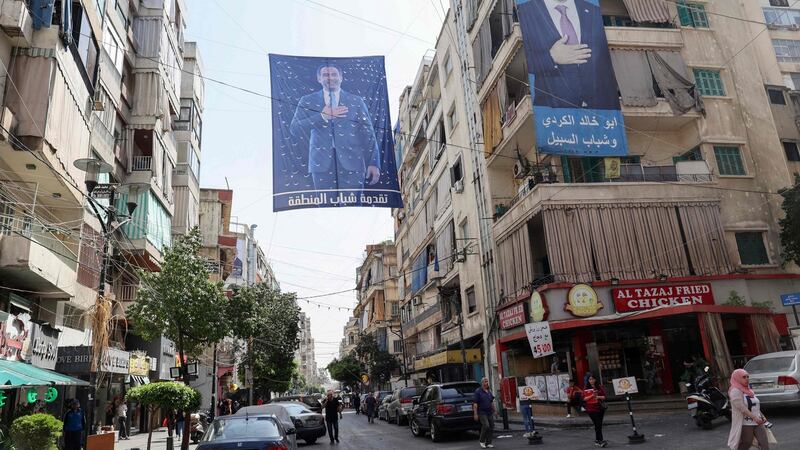 A banner bearing the picture of former Lebanese premier Saad Hariri hangs alongside a building in the Tariq al-Jdideh neighbourhood of the capital Beirut,   Photograph: Anwar Amro/AFP via Getty Images
