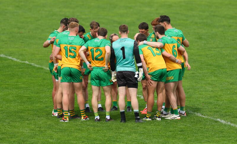 Donegal players form a huddle before last Sunday's match against Mayo. Photograph: James Crombie/Inpho