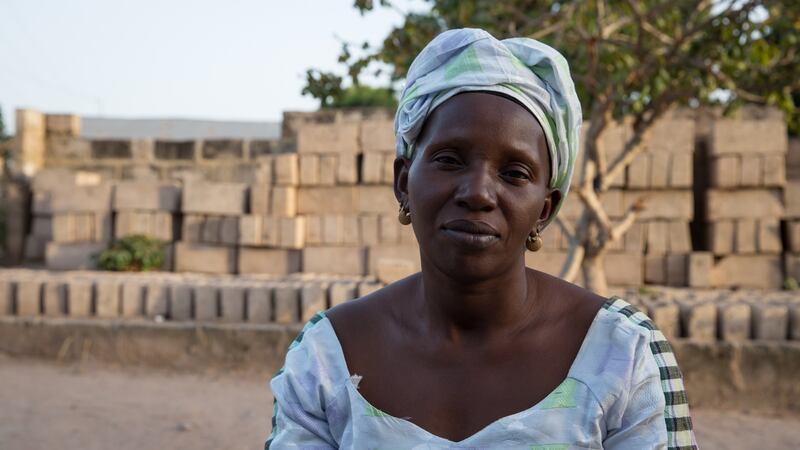 Muskeba Jarjue (39), whose mother died shortly after drinking a hallucinogenic liquid during a 2009 “witch hunt” in Sintet, western Gambia. Photograph: Sally Hayden