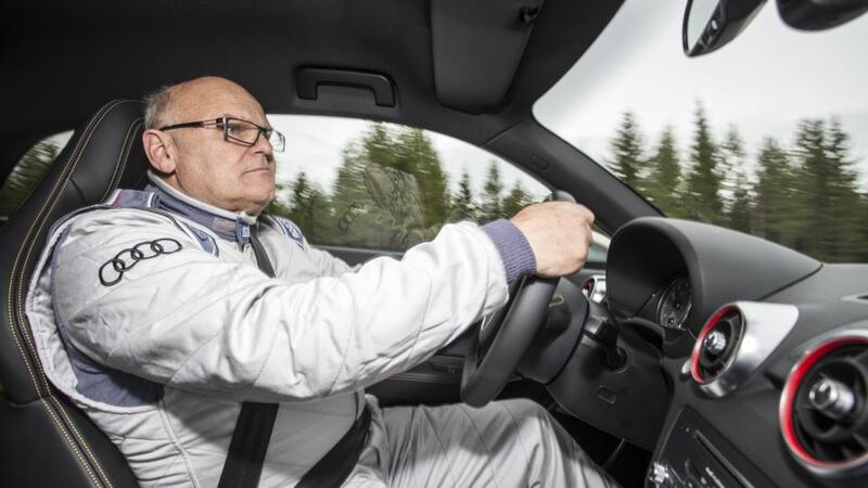 Behind the wheel: Stig Blomqvist in the S1