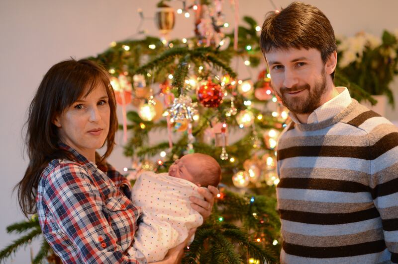 Writer Claire Kilroy and her husband Alan Downey with their newborn son Lawrence at home in Howth Co Dublin in December 2012. Photograph: Frank Miller
