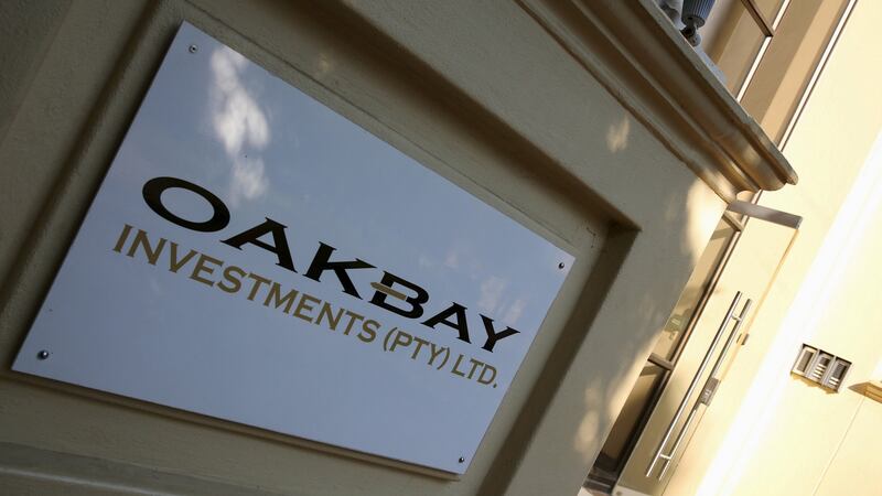 A logo of Oakbay Investments is seen at the entrance of their offices in Sandton, outside Johannesburg, South Africa. Photograph: Reuters/Siphiwe Sibeko
