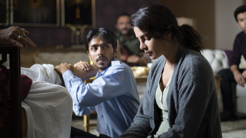 Adarsh Gourav, Priyanka Chopra Jonas and Rajkummar Rao in The White Tiger