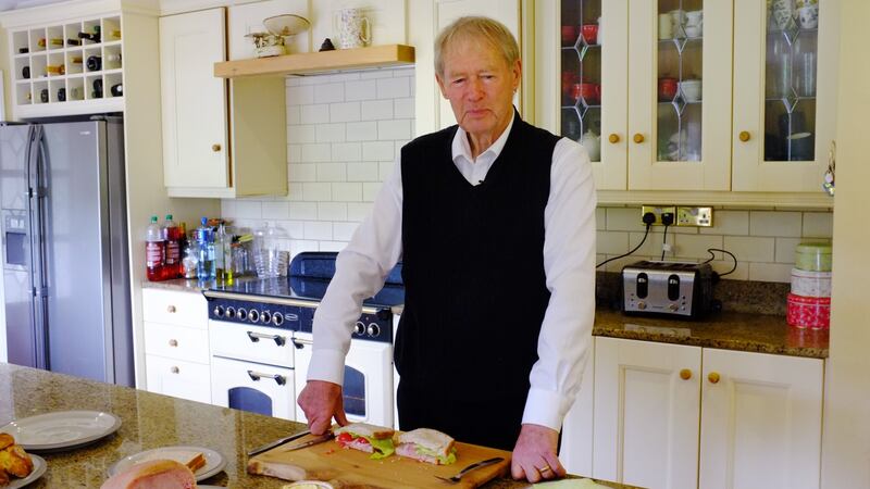 Micheál Ó Muircheartaigh  in the kitchen of his home in Co Meath.  Photograph: Bryan O’Brien