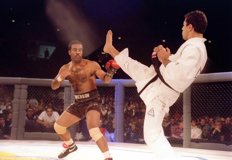Jiujitsu black belt Royce Gracie kicks at cruiserweight boxer Art Jimmerson during a 1st round match in the Ultimate Fighter Championships in Denver, Colorado. Gracie went on to win the match and eventually the championship. Photograph: Markus Boes