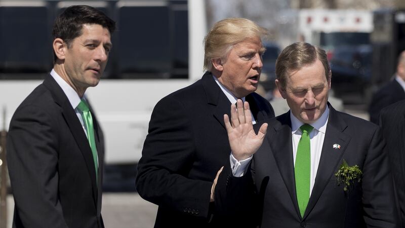US president Donald Trump walks away after shaking hands with Taoiseach Enda Kenny, Ireland’s prime minister, right, following a Friends of Ireland lunch with US House speaker Paul Ryan (left) in Washington D.C. on Thursday. Photograph: Andrew Harrer/Bloomberg.